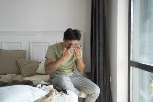 side view frustrated man suffering from allergies