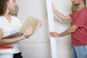 young couple doing apartment repair together themselves 1