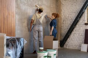 couple painting their new home together