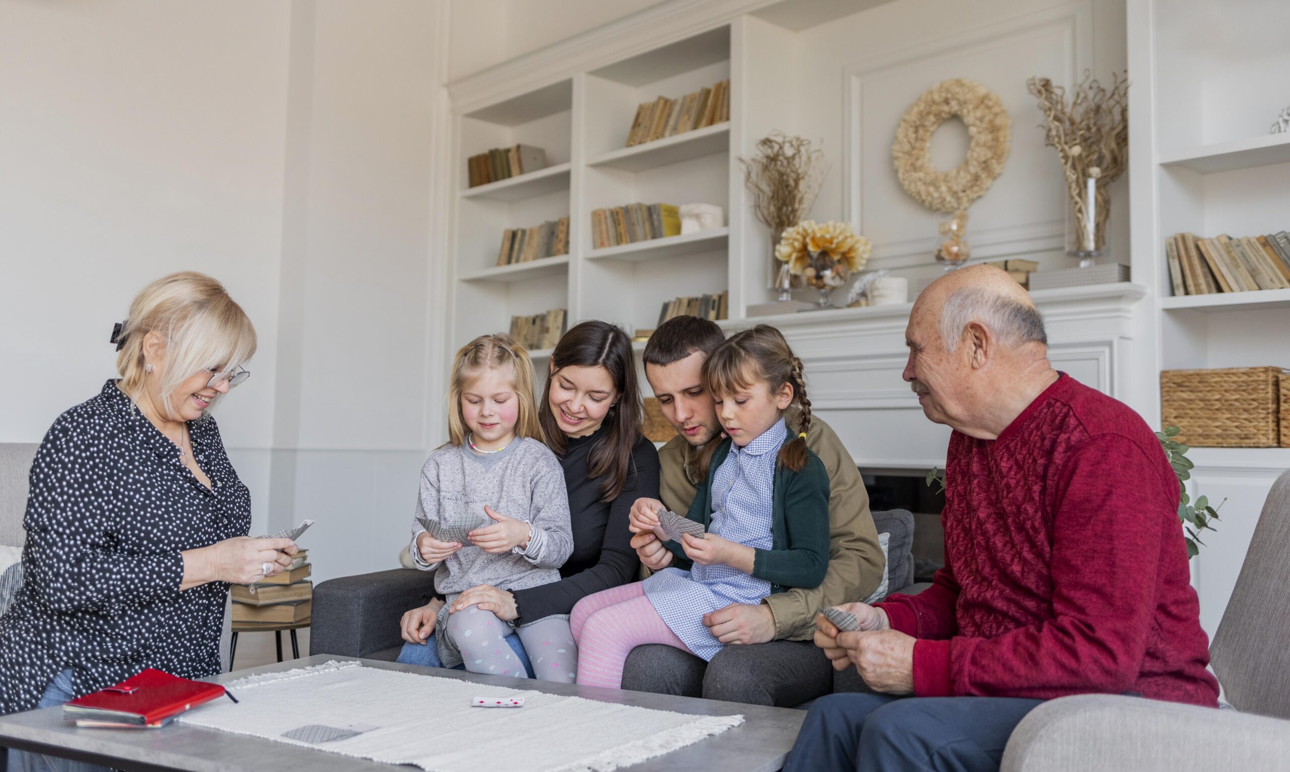 medium shot family members playing games scaled