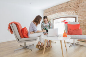 women collaborating office