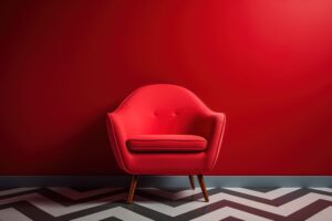 solitary crimson chair offers pop color against geometric patterned backdrop