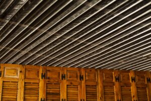 wooden closet with sheets ceiling