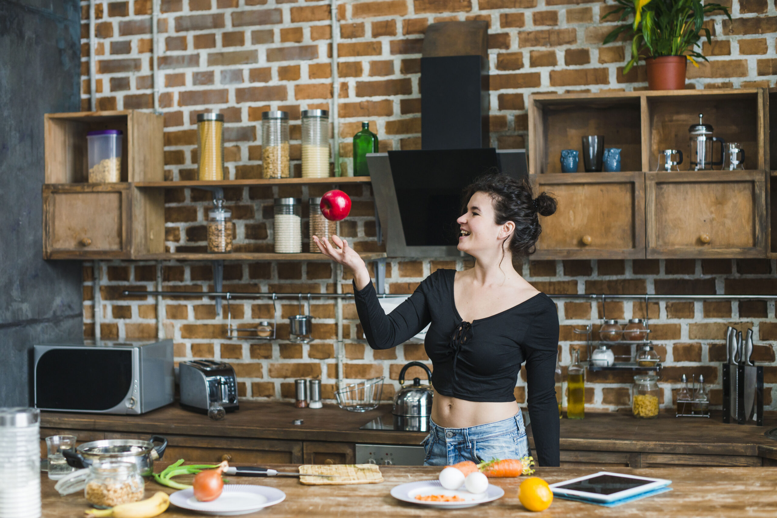 young brunette throwing up apple scaled