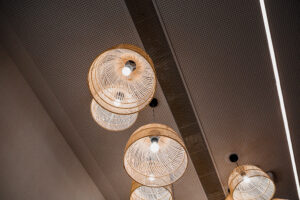 round chandeliers hanging from ceiling