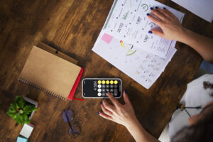 top view woman working as economist