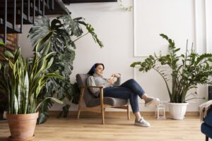 woman using smartphone as habit